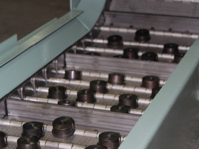 Conveyor for parts