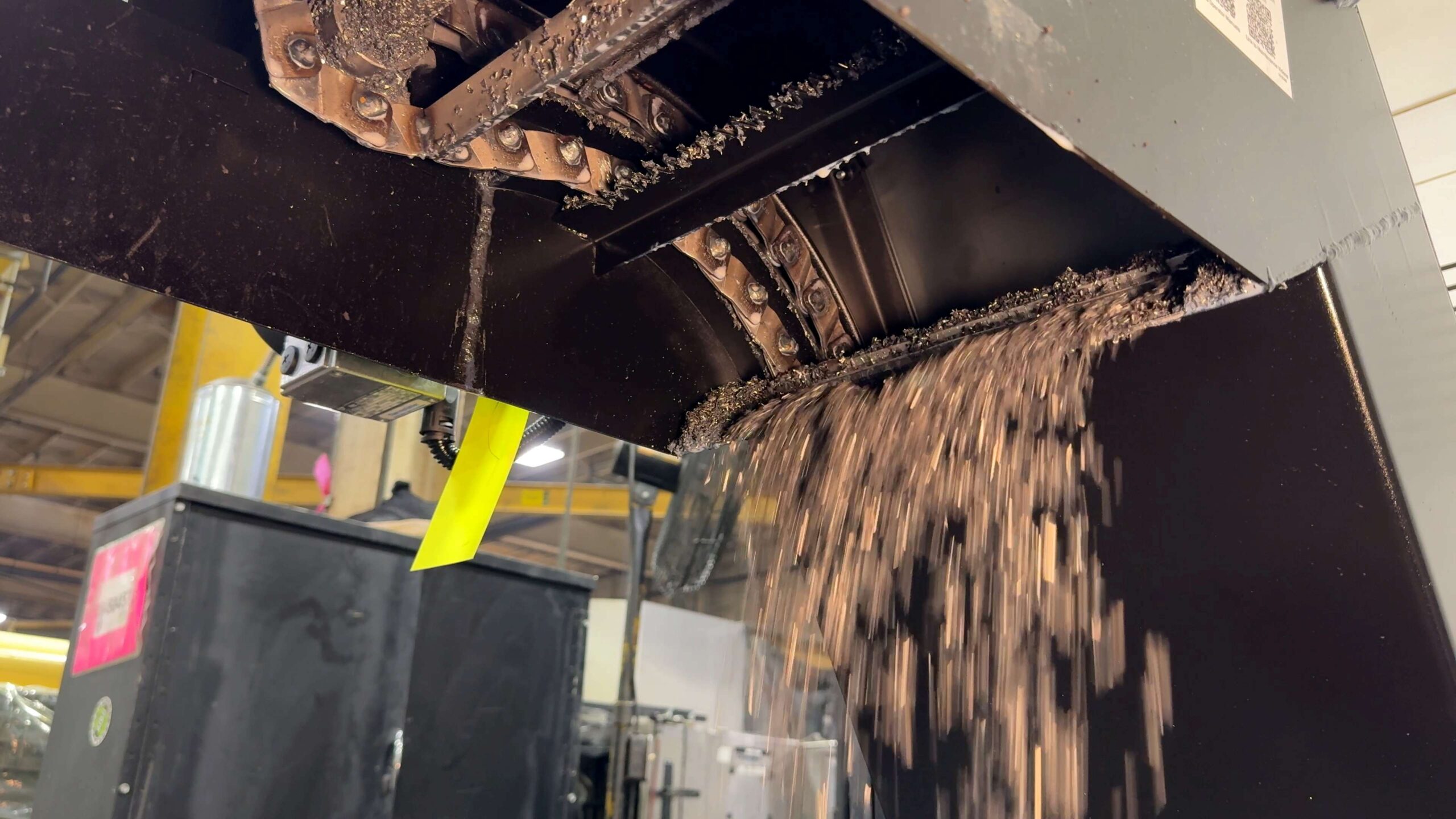 cast iron chips exiting conveyor